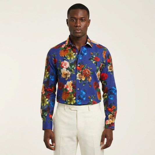 Blue floral Philippe Royal button-up shirt with a classic collar and long sleeves, featuring a vibrant floral pattern.