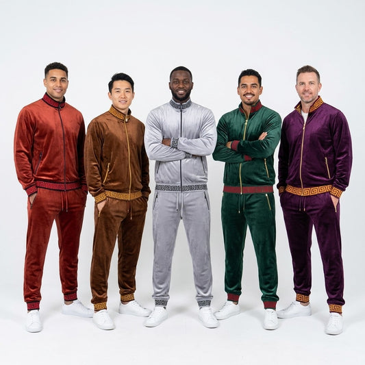 Gray Prestige Velour Jogger Set with matching sweatshirt, featuring elastic waistband and cuffs, displayed on a hanger.
