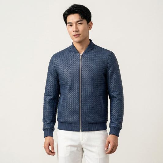 Navy men's SVELG premium woven leather bomber jacket made from 100% lambskin, styled on a model.