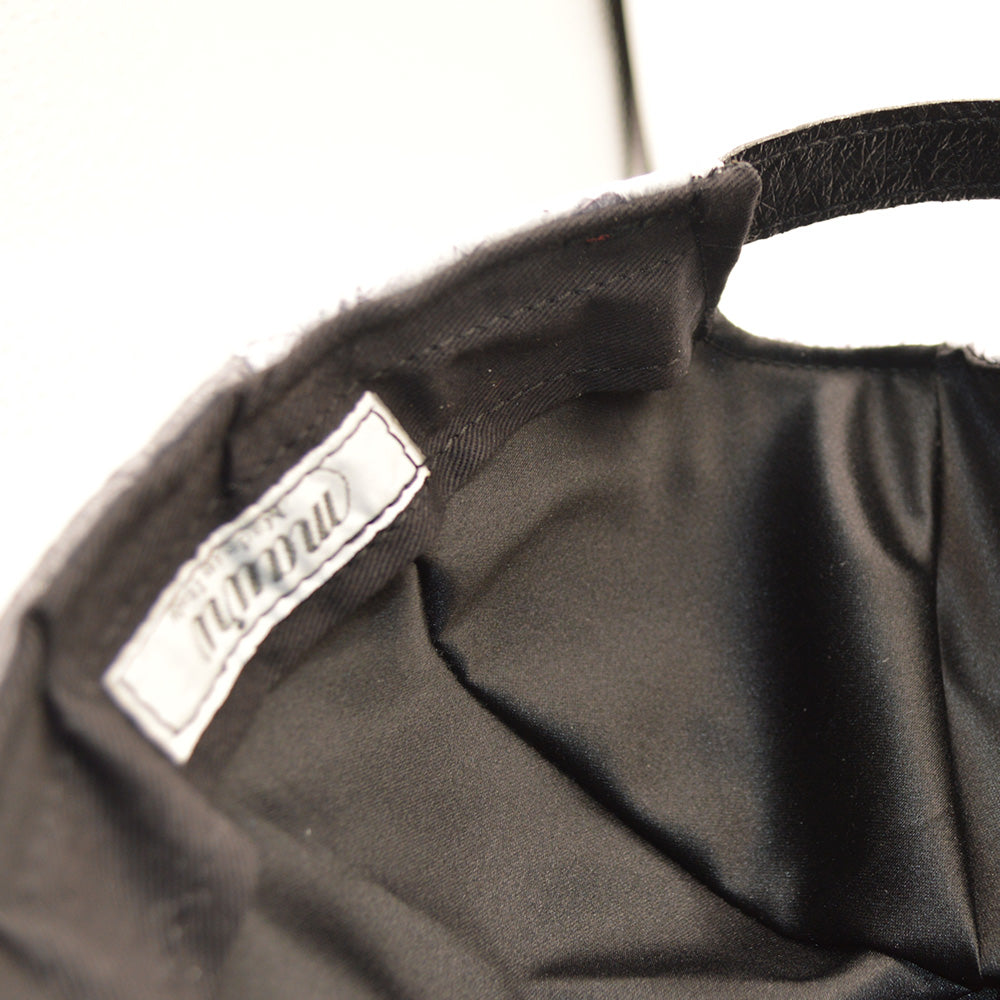 Mauri Fade Black Alligator adjustable hat showing the black alligator texture and adjustable strap at the back