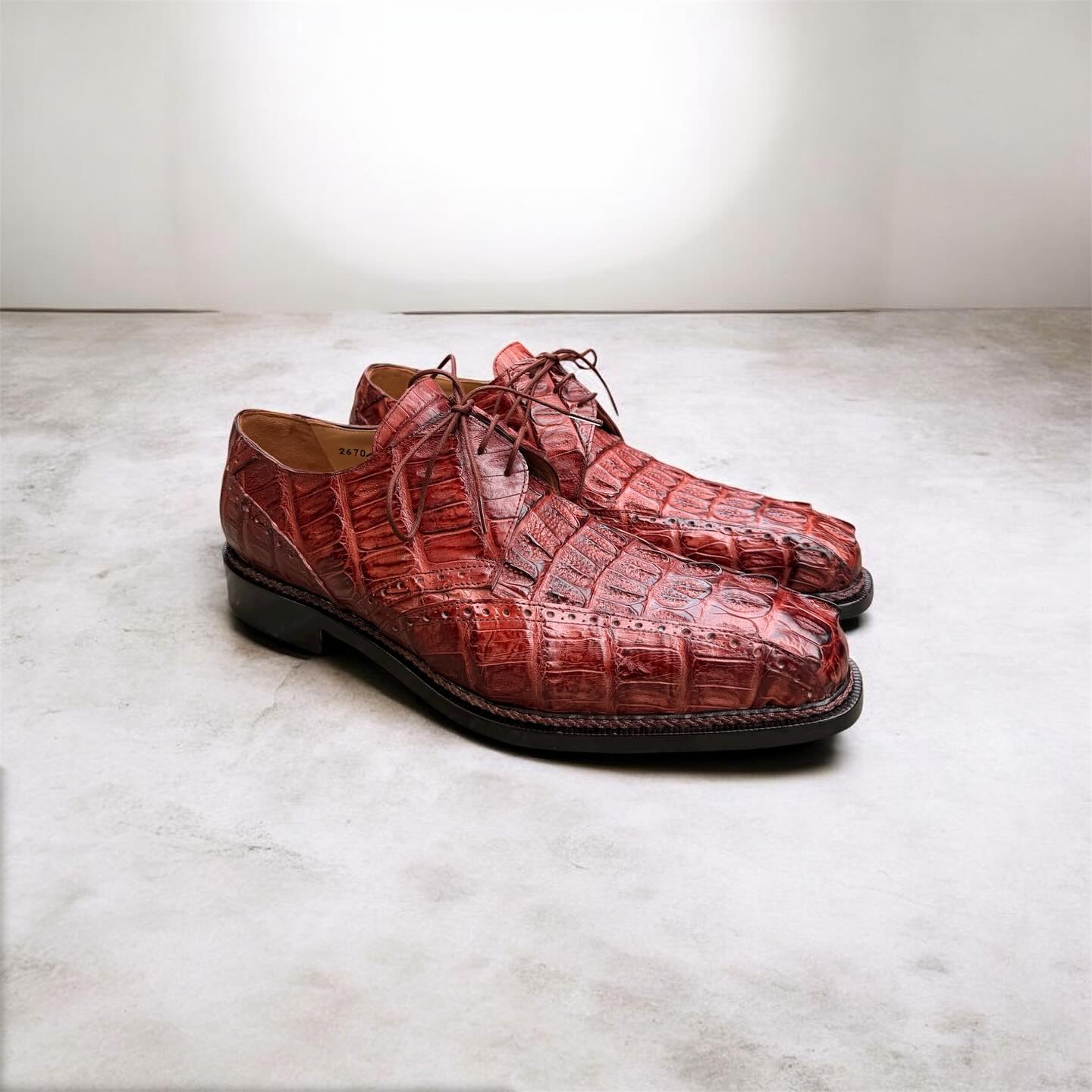 Mauri 2670 Caiman Hornback dress shoes with lace-up design, black leather, and textured hornback crocodile pattern.