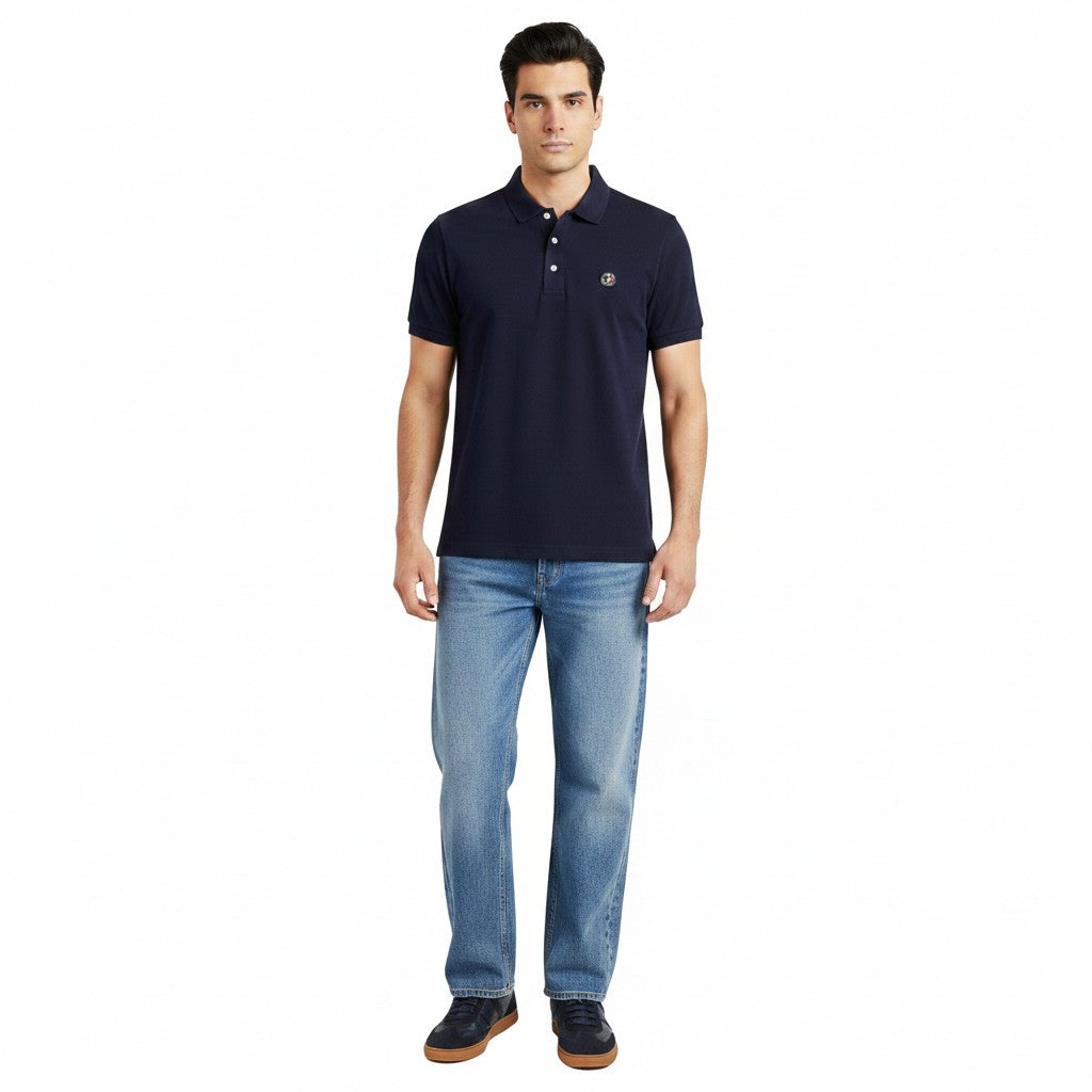 Impulso Polo Club shirt in light blue with collar and buttons, styled casually on a model.