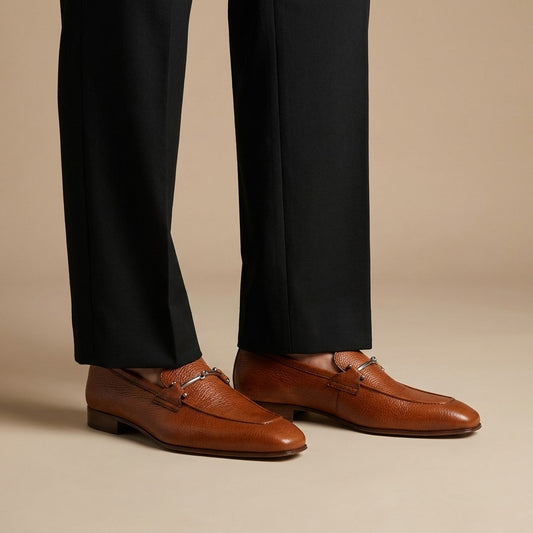Donald Pliner Jackson tumbled calf leather loafer showing smooth, rounded toe and sleek slip-on design.
