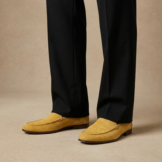 Donald Pliner Slater loafer in black leather with sleek slip-on design and detailed stitching, stylish men's footwear.
