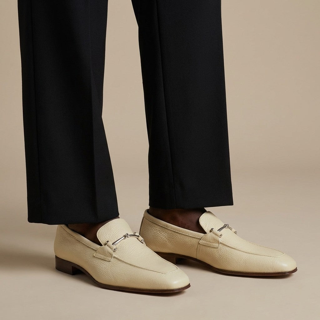 Donald Pliner Jackson tumbled calf leather loafer, showcasing sleek design and rich texture on a stylish men's footwear.