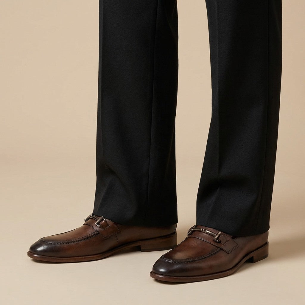 Bruno Magli Sante double gore classic leather loafer featuring smooth black leather and sleek slip-on design.