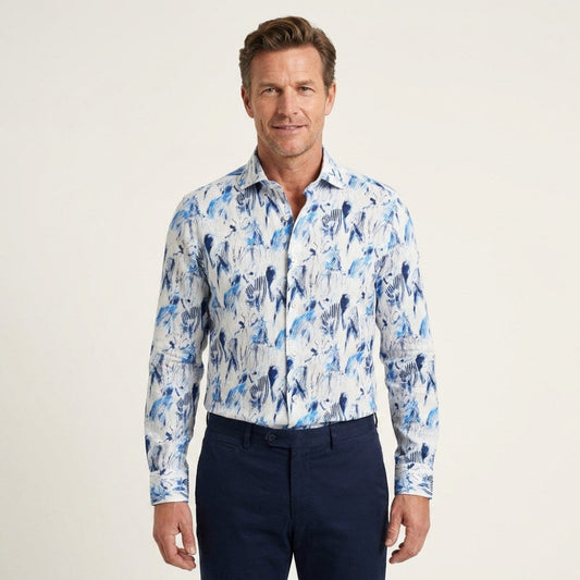 Torras designed 100% linen shirt in a relaxed fit, featuring a classic collar and button-front, displayed on a hanger.