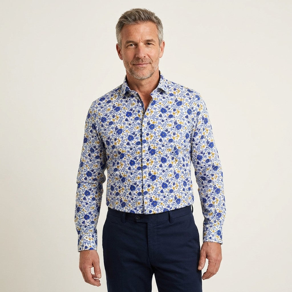 Blue Torras floral print cotton shirt with long sleeves and button front, featuring a vibrant floral pattern.