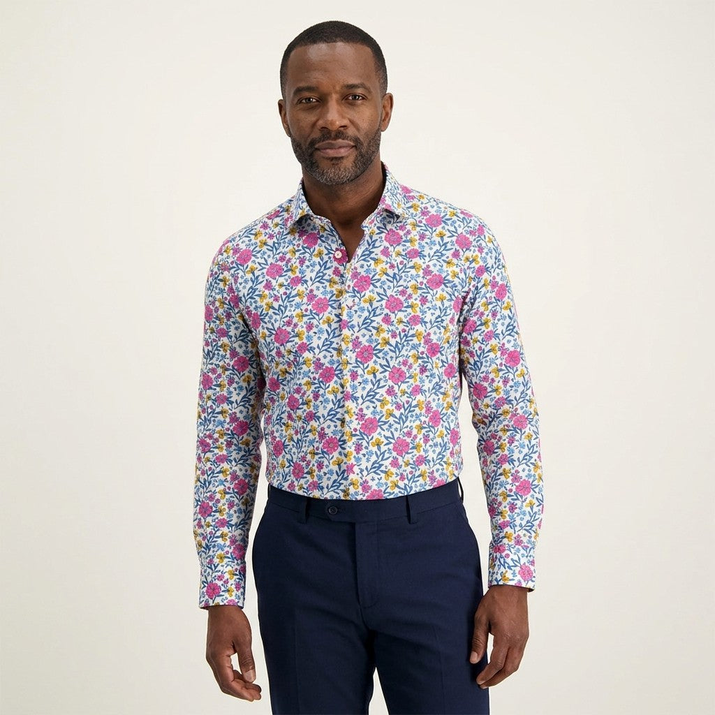 Pink Torras floral print cotton shirt with long sleeves and button-front design, showcasing vibrant floral patterns.