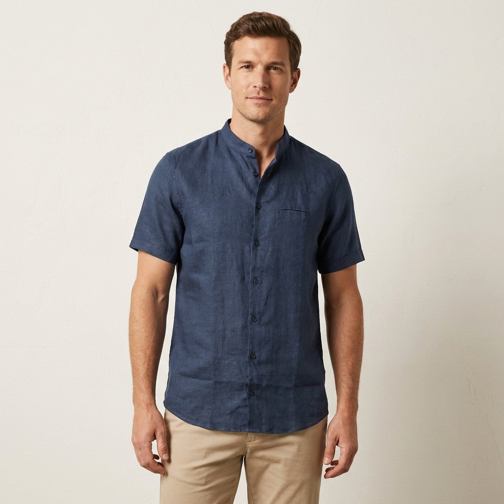 Navy Andrea BOSSI short sleeve linen button-up shirt displayed on a hanger with visible collar and button details.