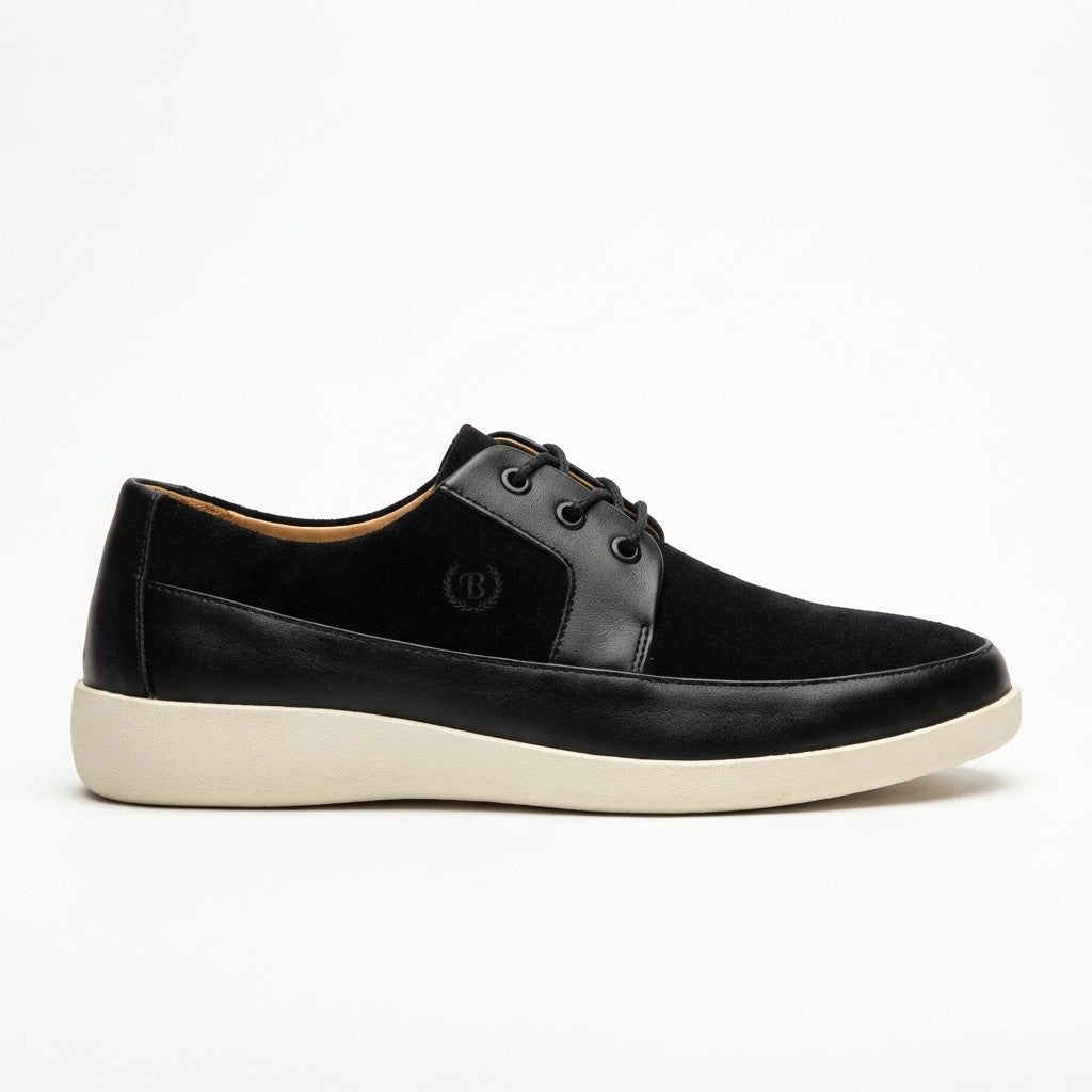 Black Johnny Famous New York Park West low top sneakers with white soles and stylish design, displayed on a plain background.