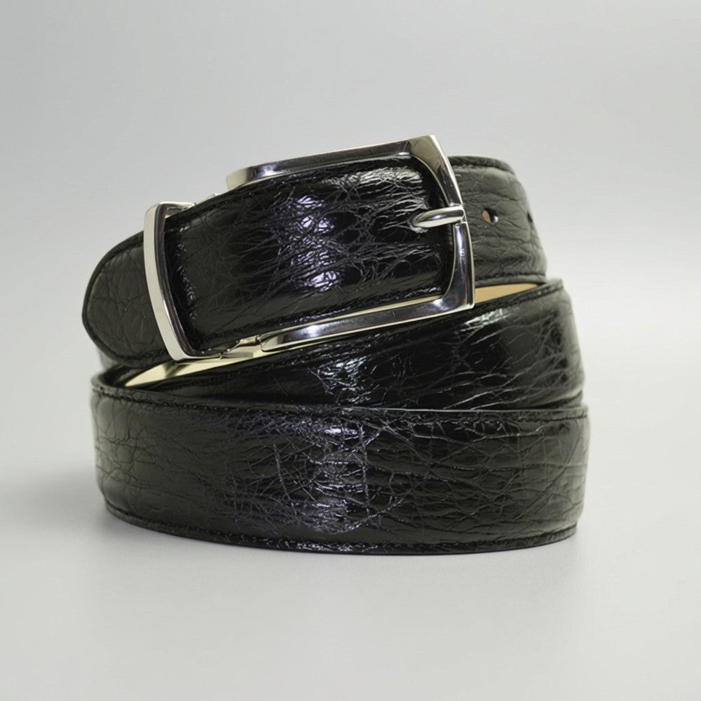 Black and silver Mauri Alligator Belt showing textured alligator leather and sleek metal buckle.