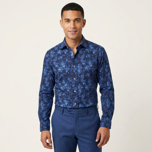 Philippe dark blue floral button-up shirt with detailed fabric pattern, casual style, long sleeves, and collared neckline.