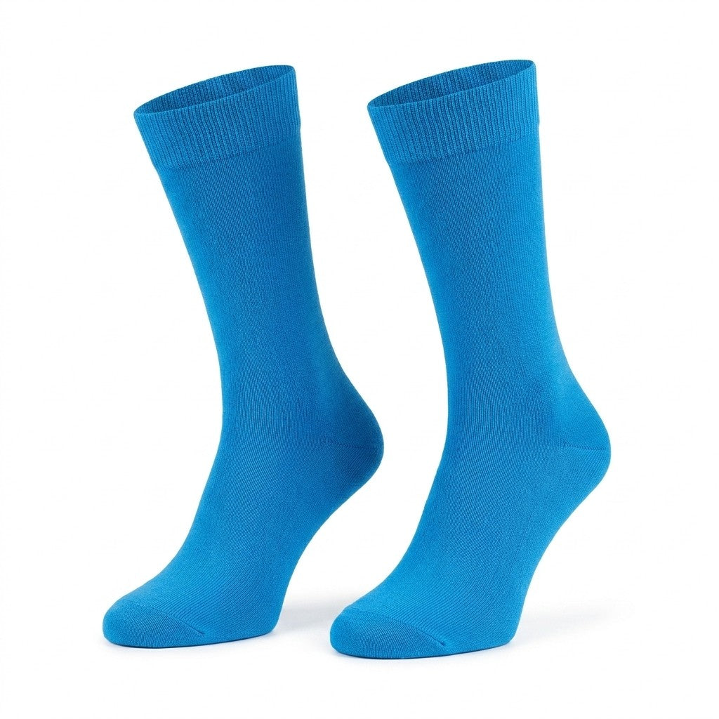 Bright blue men's dress socks by Cellini Uomo, made from 100% Filoscozia cotton, solid color, stylish and comfortable.
