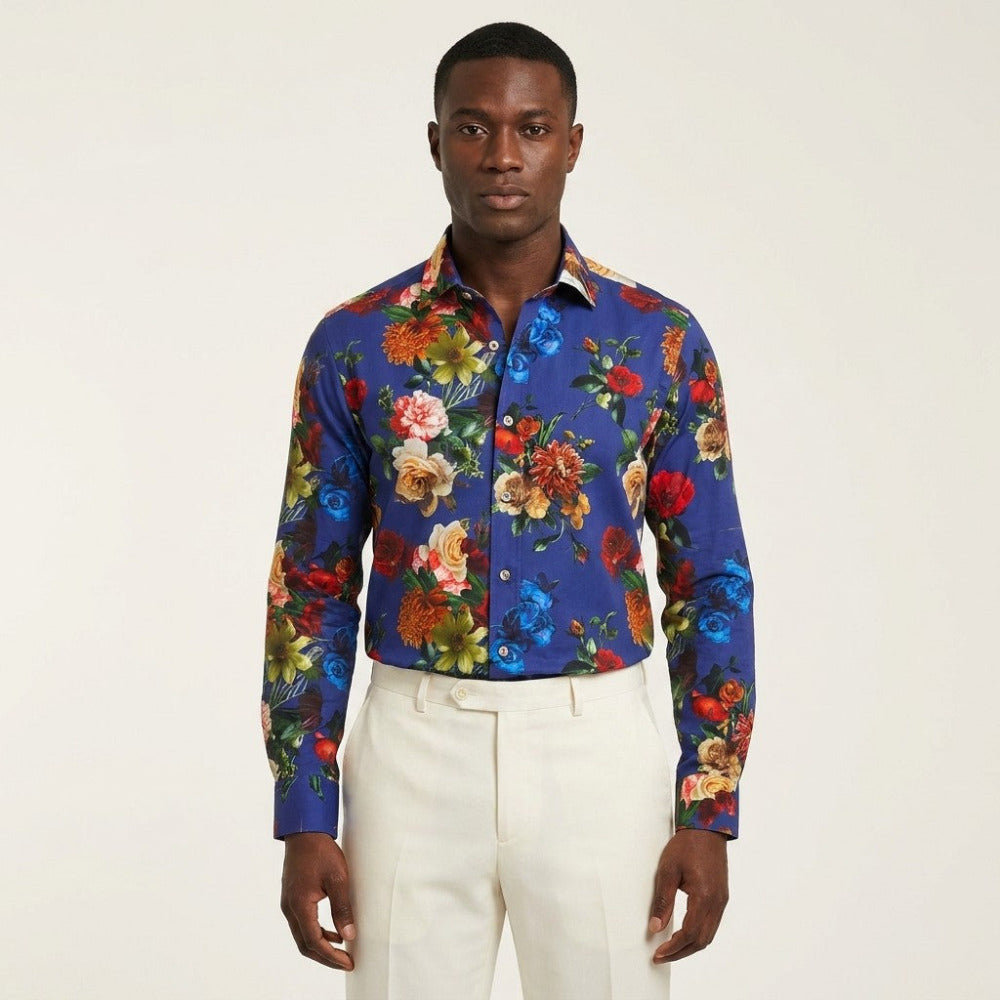 Blue floral Philippe Royal button-up shirt with a classic collar and long sleeves, featuring a vibrant floral pattern.