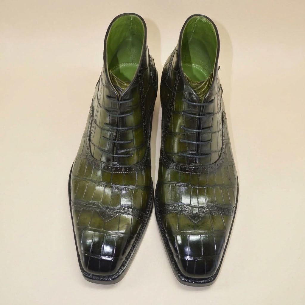Sheriff Green Alligator Skin Wingtip Boot with detailed stitching and sleek design, showcasing the luxurious leather texture.