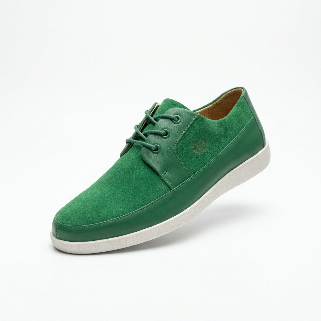Green Johnny Famous New York Park West low top sneakers with white soles and laces, casual style, displayed on a plain background.