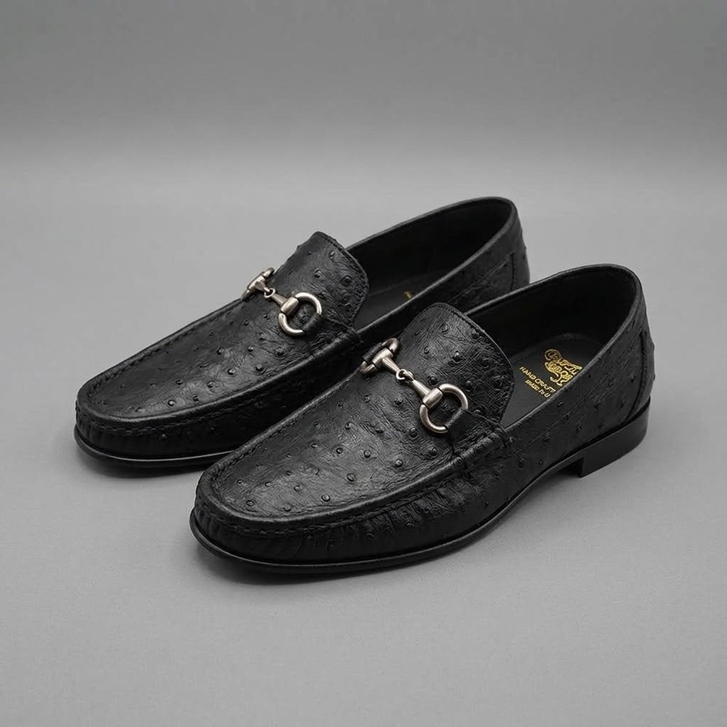 Calzoleria Toscana Ostrich Loafers in dark colors, showcasing elegant leather footwear with detailed stitching and sleek design.