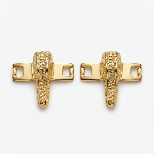Mauri alligator shoe lace bar accessories in gold and silver with detailed textured design for footwear embellishment.