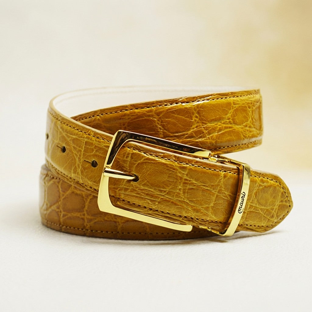 Mauri alligator belt in mustard color with a sleek buckle, showcasing textured genuine alligator leather for a stylish look.
