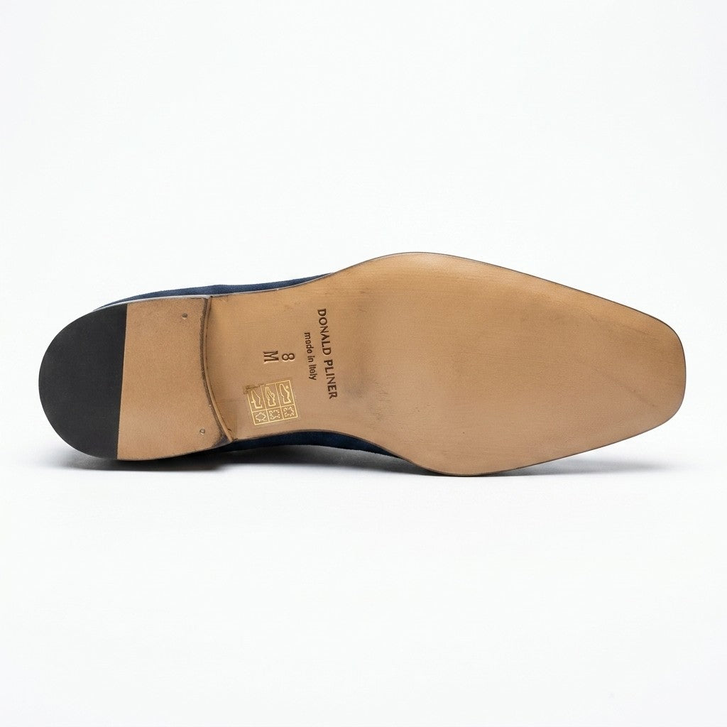 Donald Pliner Jayce navy blue suede penny loafers, stylish men's slip-on shoes on a neutral background