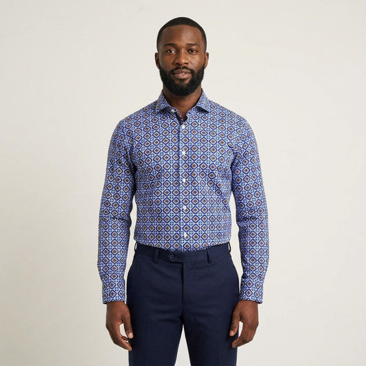 Navy Torras geometric print cotton shirt with long sleeves and collar, displayed on a hanger.