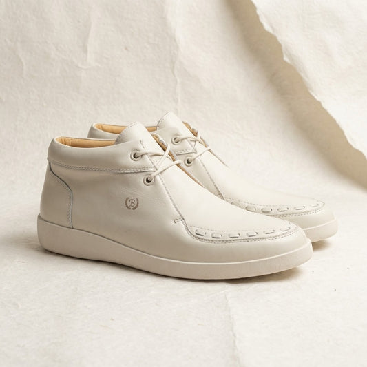 Off-white leather high-top sneakers by Cellini Uomo, Johnny Famous New York SOHO style with stylish stitching and casual design