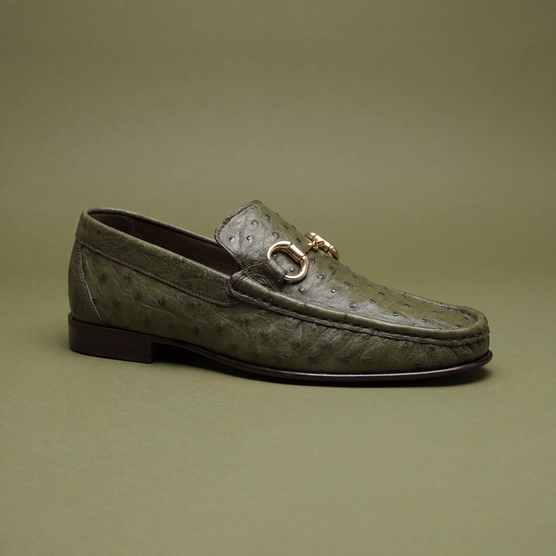 Calzoleria Toscana V2-3238 dark olive green ostrich leather loafers with sleek design and textured finish.