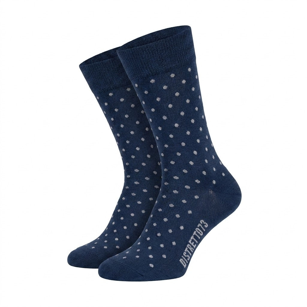 Navy polka dot men's cotton socks from Cellini Uomo's Distretto73 Filoscozia collection, featuring a classic polka dot pattern.