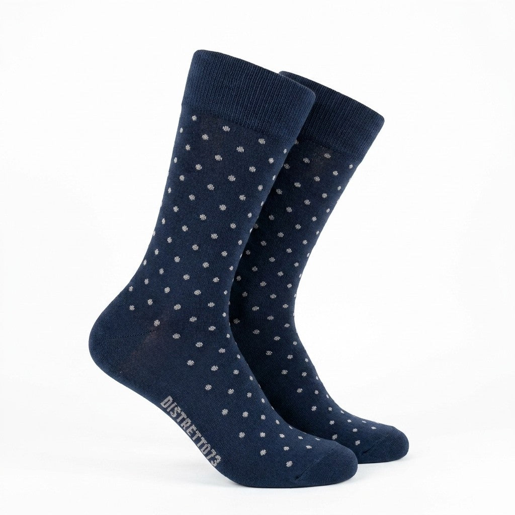 Navy polka dot cotton socks for men by Cellini Uomo, part of Distretto73 Filoscozia collection, shown on a plain background.