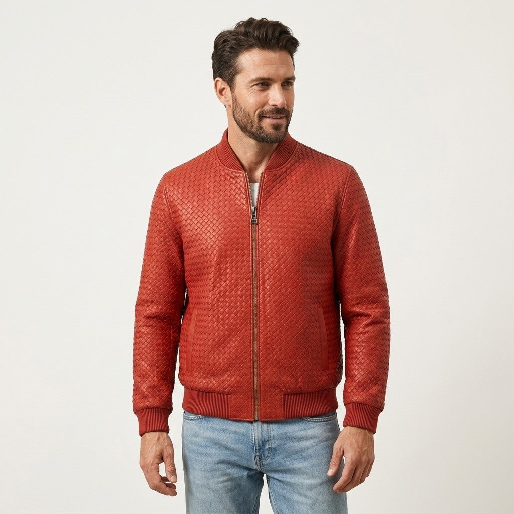 Red male model wearing SVELG men's woven lambskin leather bomber jacket, showcasing its stylish design and premium craftsmanship.