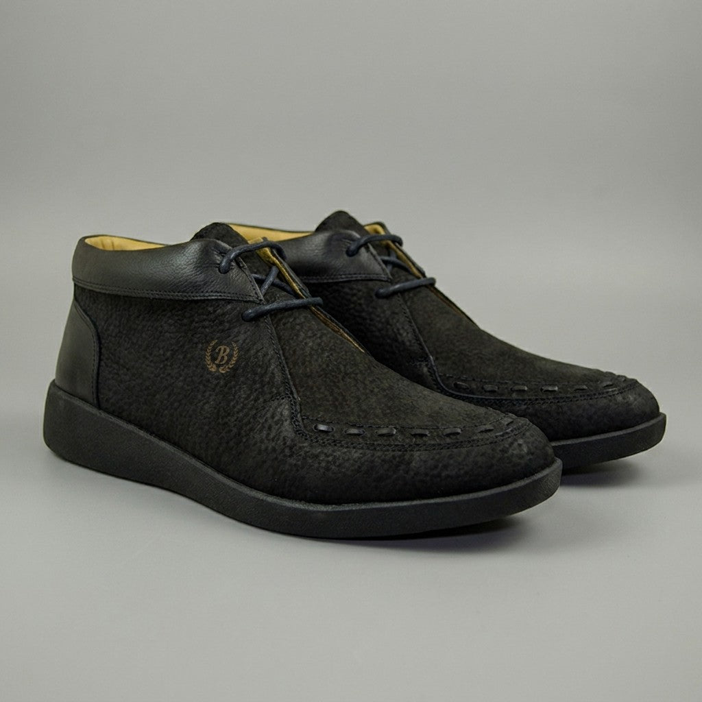 Johnny Famous Soho black high-top shoes with stylish design and sturdy sole, perfect for casual and streetwear outfits.