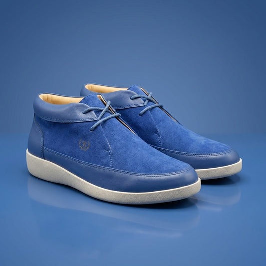 Blue suede Johnny Famous New York Central Park high top sneakers with white laces and rubber sole, displayed on a plain background.