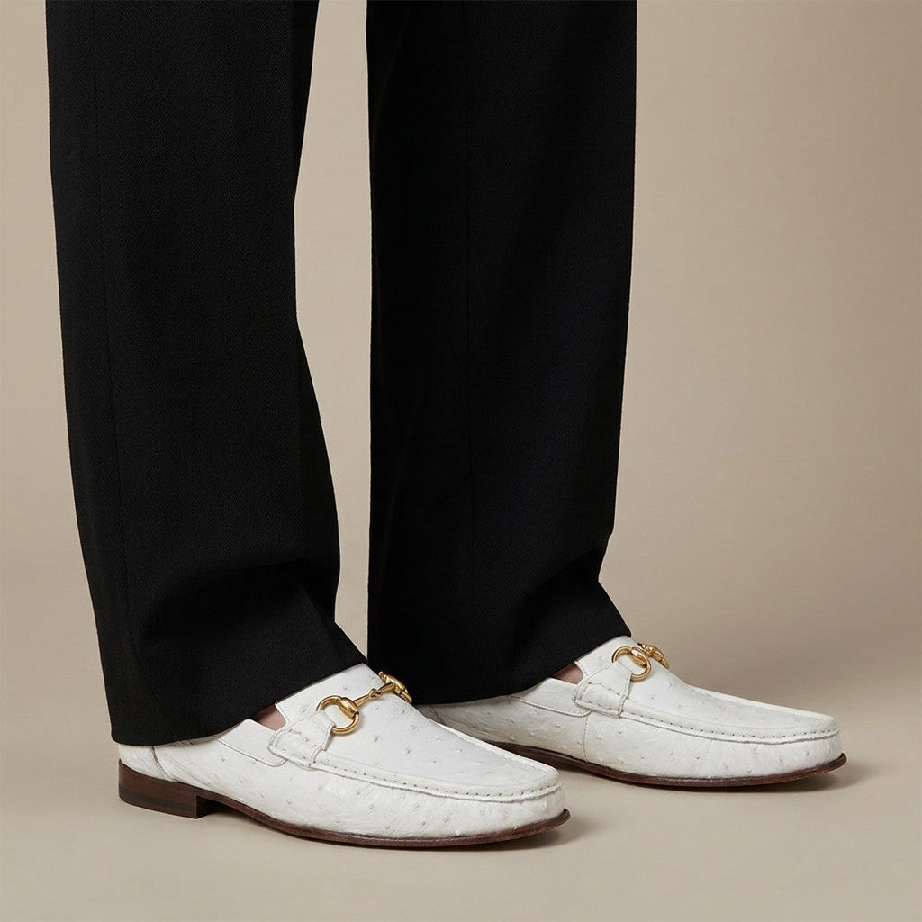 White ostrich leather loafers from Calzoleria Toscana V2-3238 in bright colors, showcasing detailed texture and stylish design.